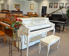 Antique white Sohmer console piano